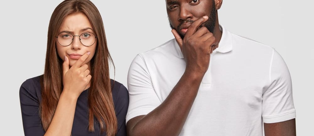 a man and woman standing next to each other